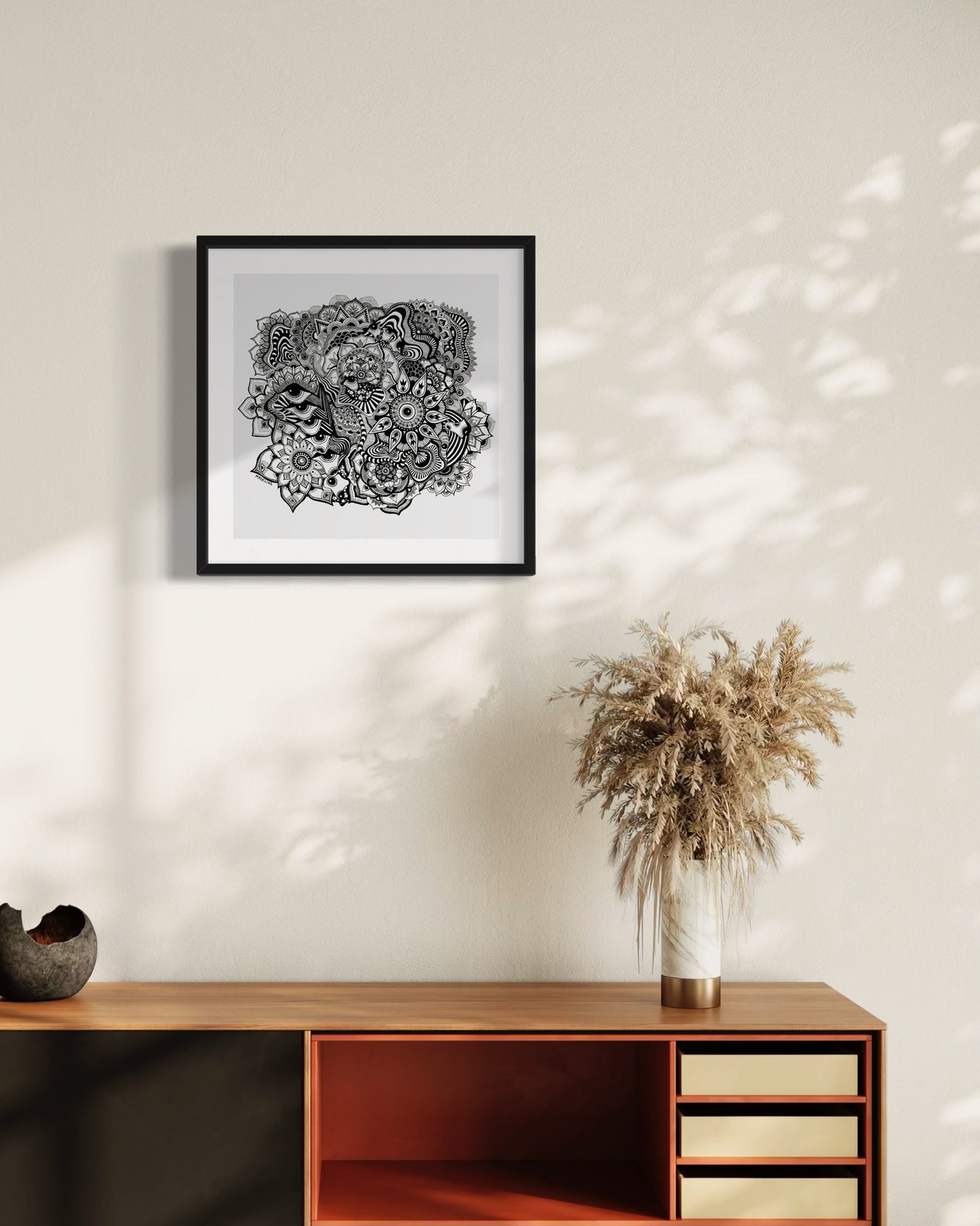 Framed black and white abstract art with eyes, mandalas, and fine line whimsical detail