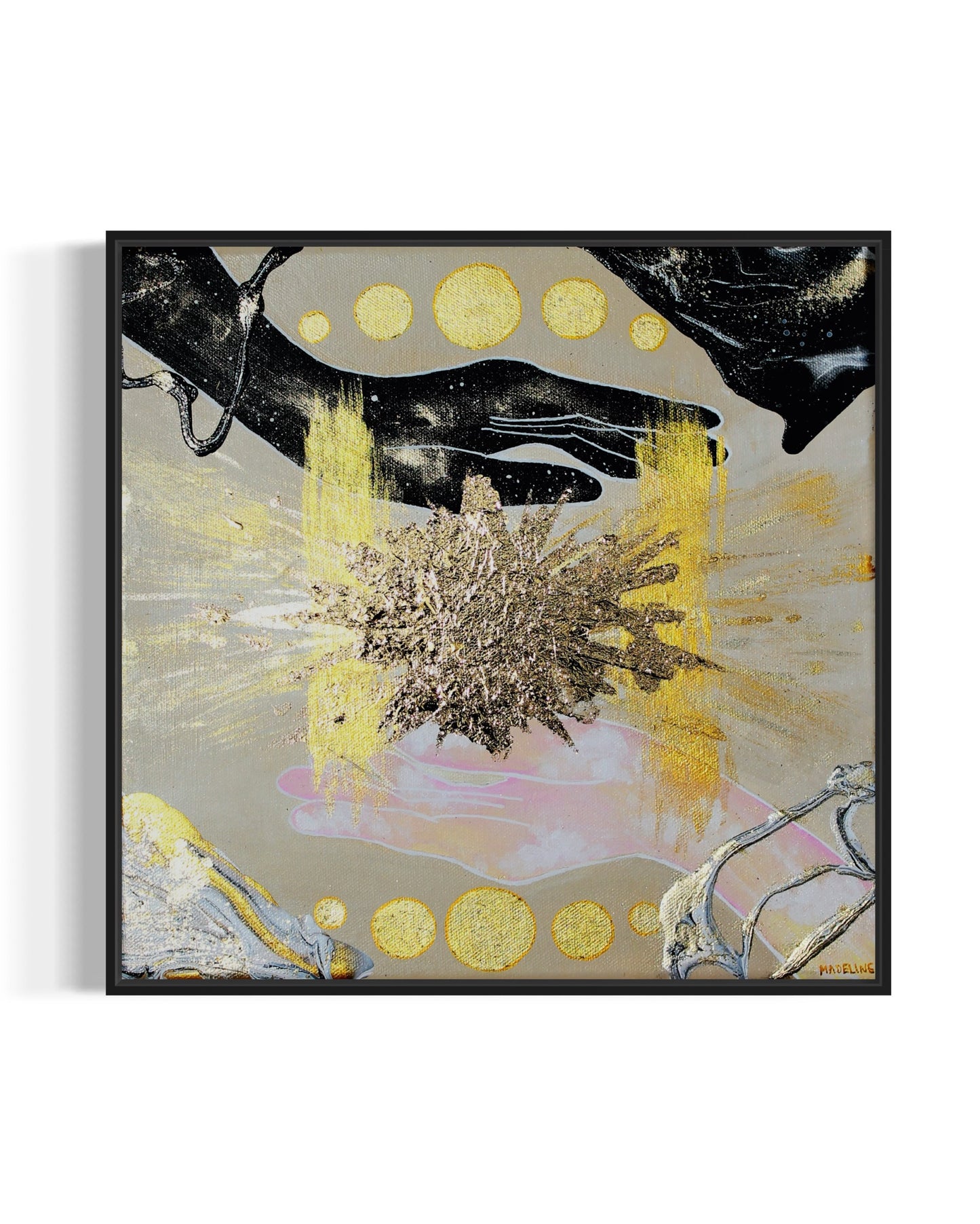 Framed abstract artwork of hands filled with the sky, an exploding gold star and geometric shapes on a tan background.