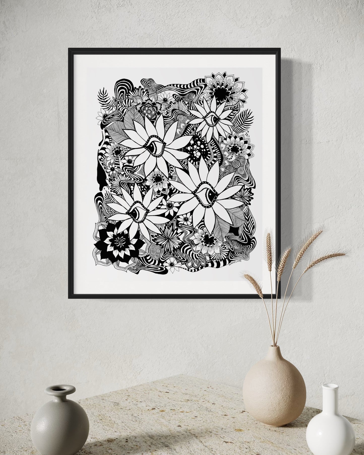 black and white abstract botanical artwork with eyes inside daisies and a whimsical fine linework background