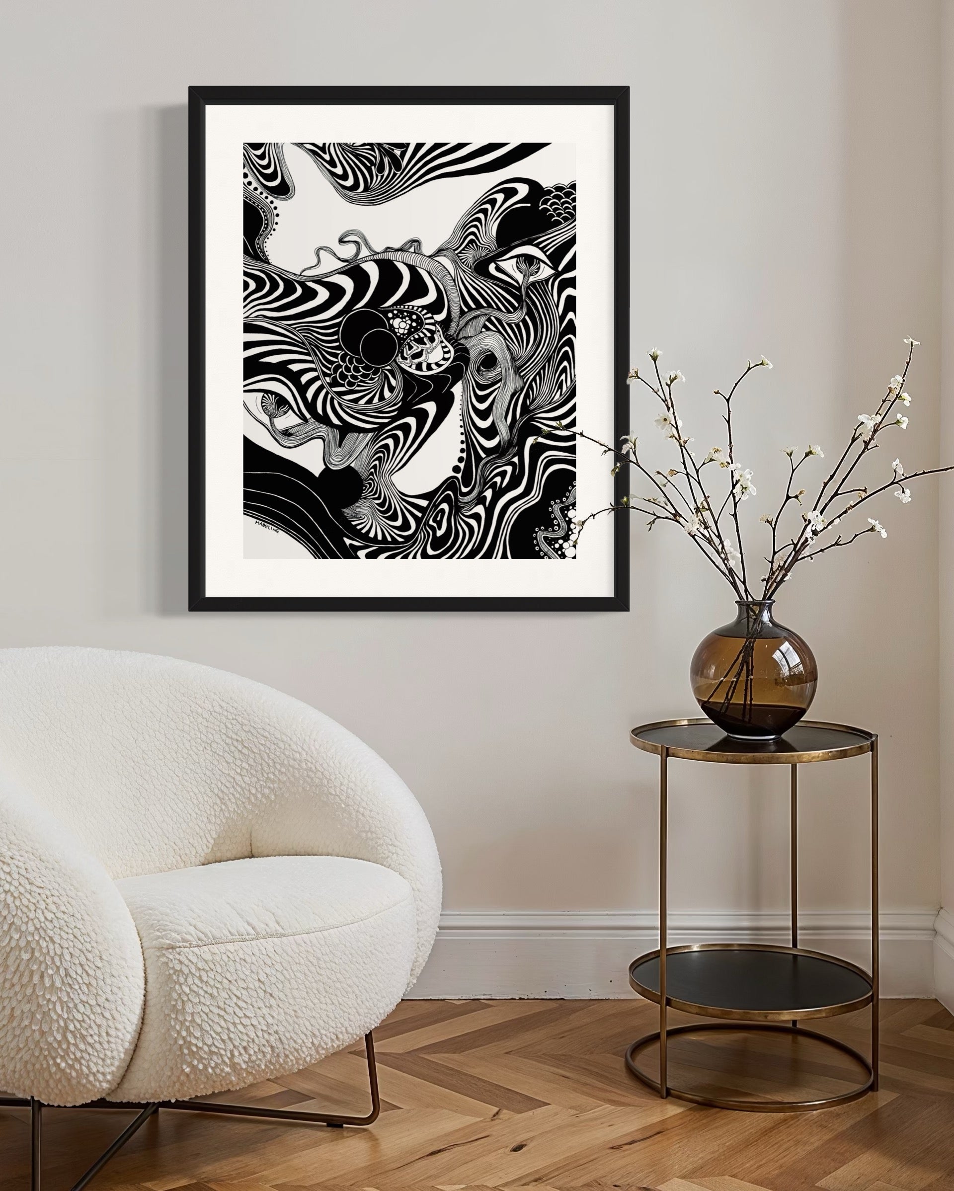 Framed black and white abstract artwork of flowing whimsical linework patterns coming out of eyes