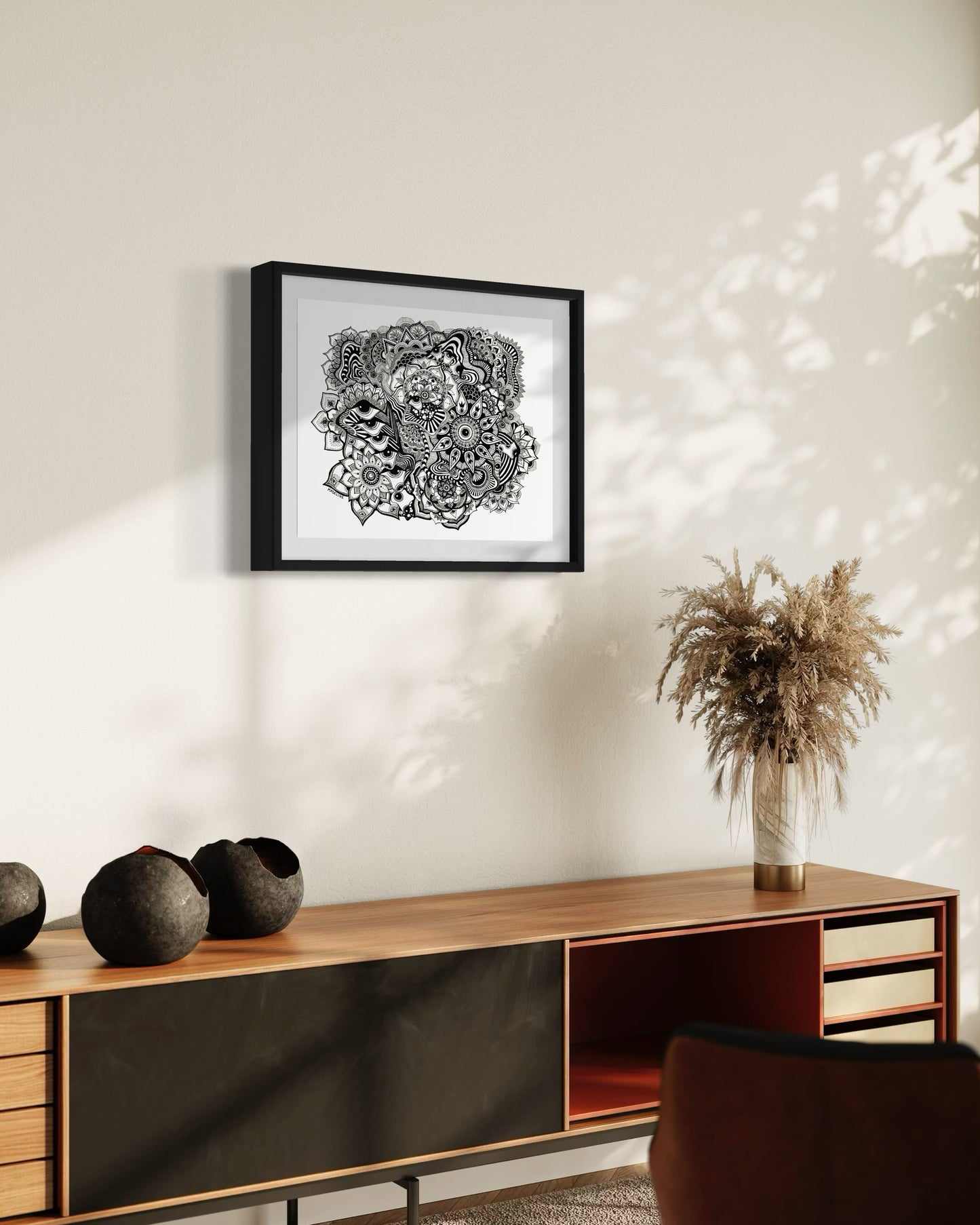 Framed black and white abstract art with eyes, mandalas, and fine line whimsical detail