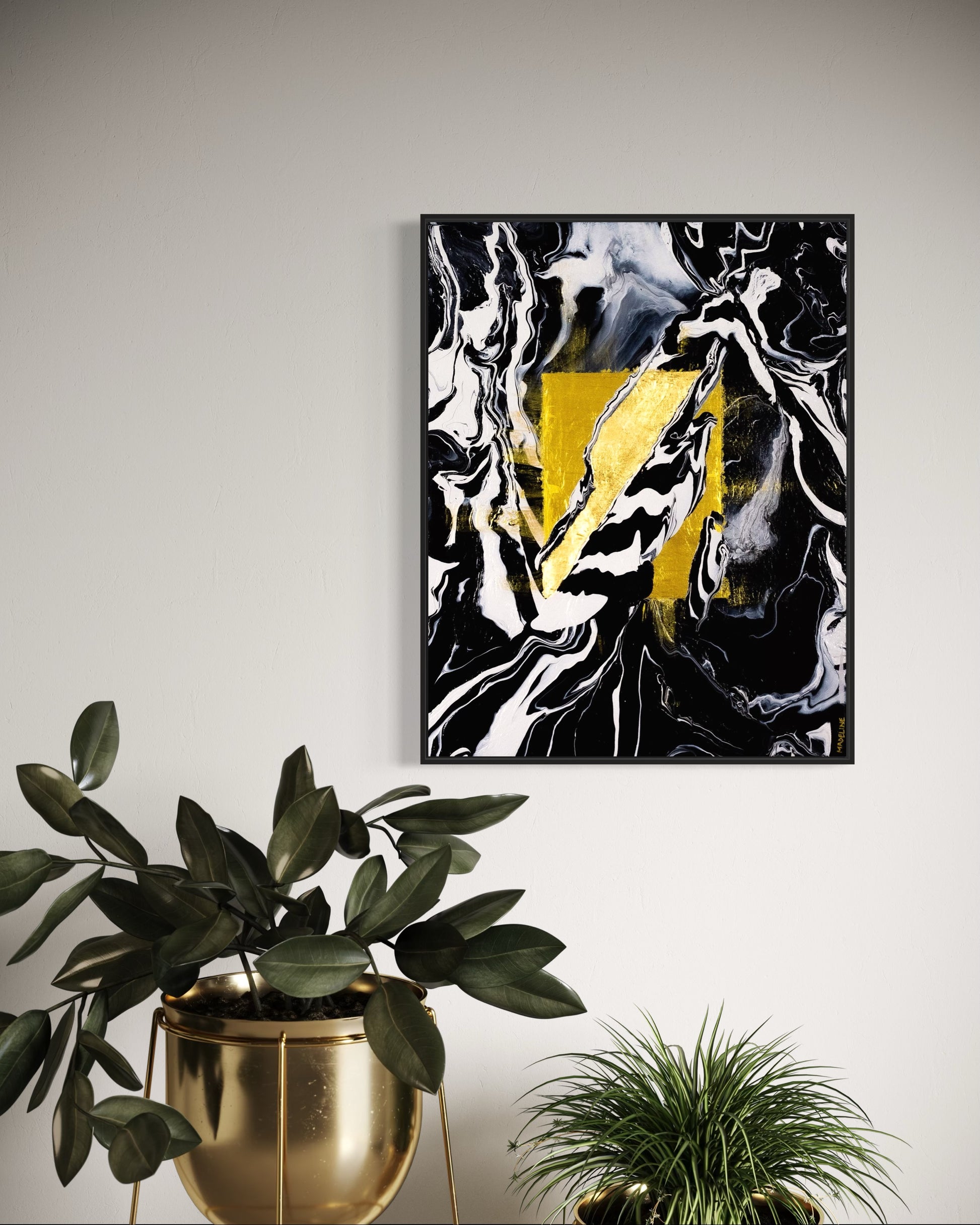 Abstract art piece with gold square and black, white, and gray abstract swirls and shapes