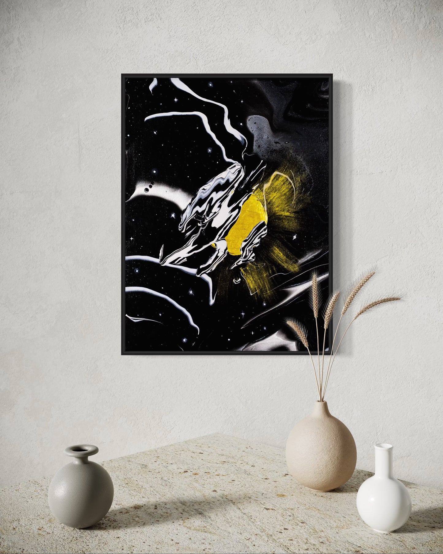 Abstract artwork with a gold acrylic sun and abstract moon on a black starry night silver and black background