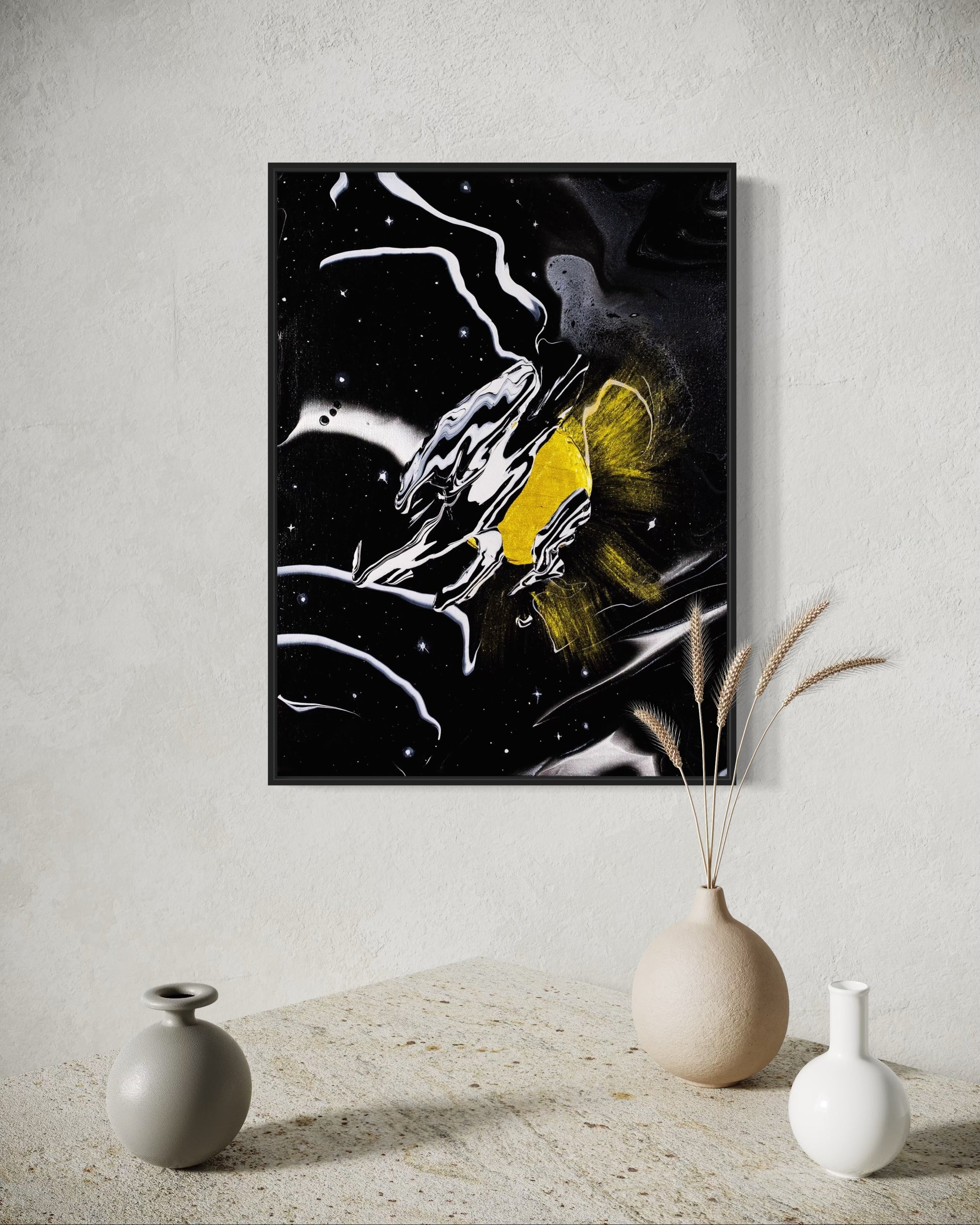 Abstract artwork with a gold acrylic sun and abstract moon on a black starry night silver and black background