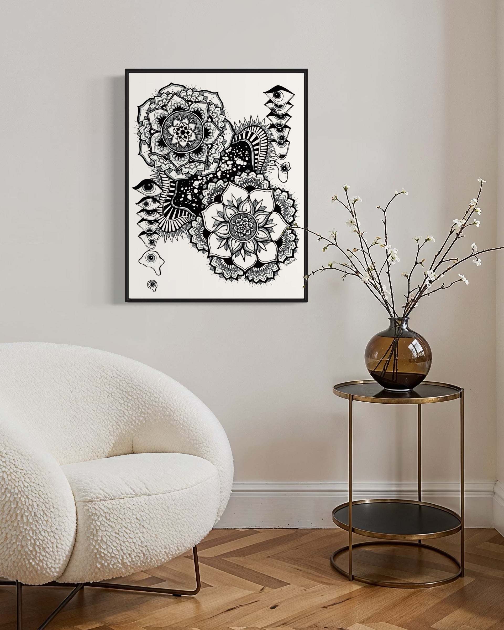 Black and white floral mandala and abstract eye design on a white background