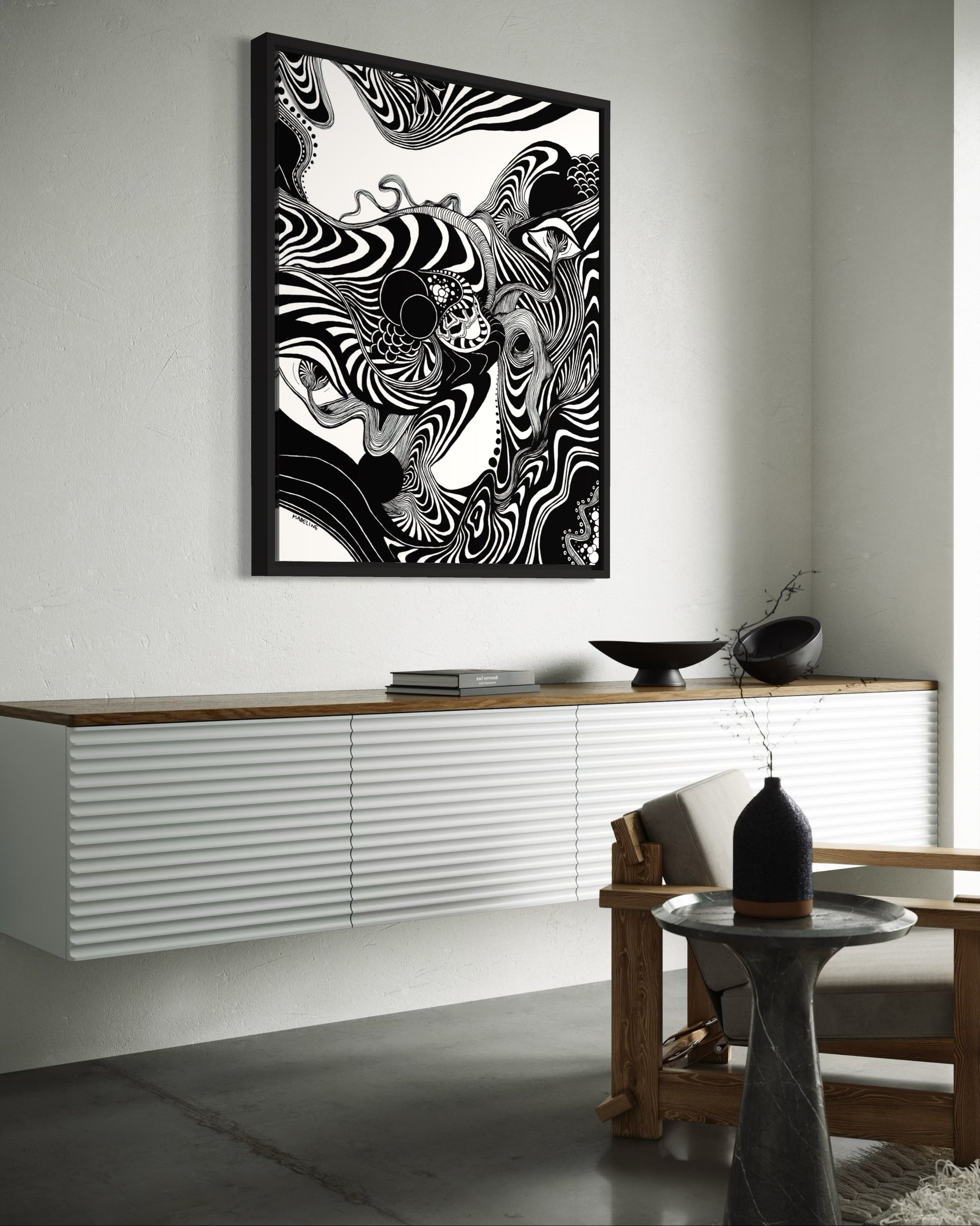 Framed black and white abstract artwork of flowing whimsical linework patterns coming out of eyes