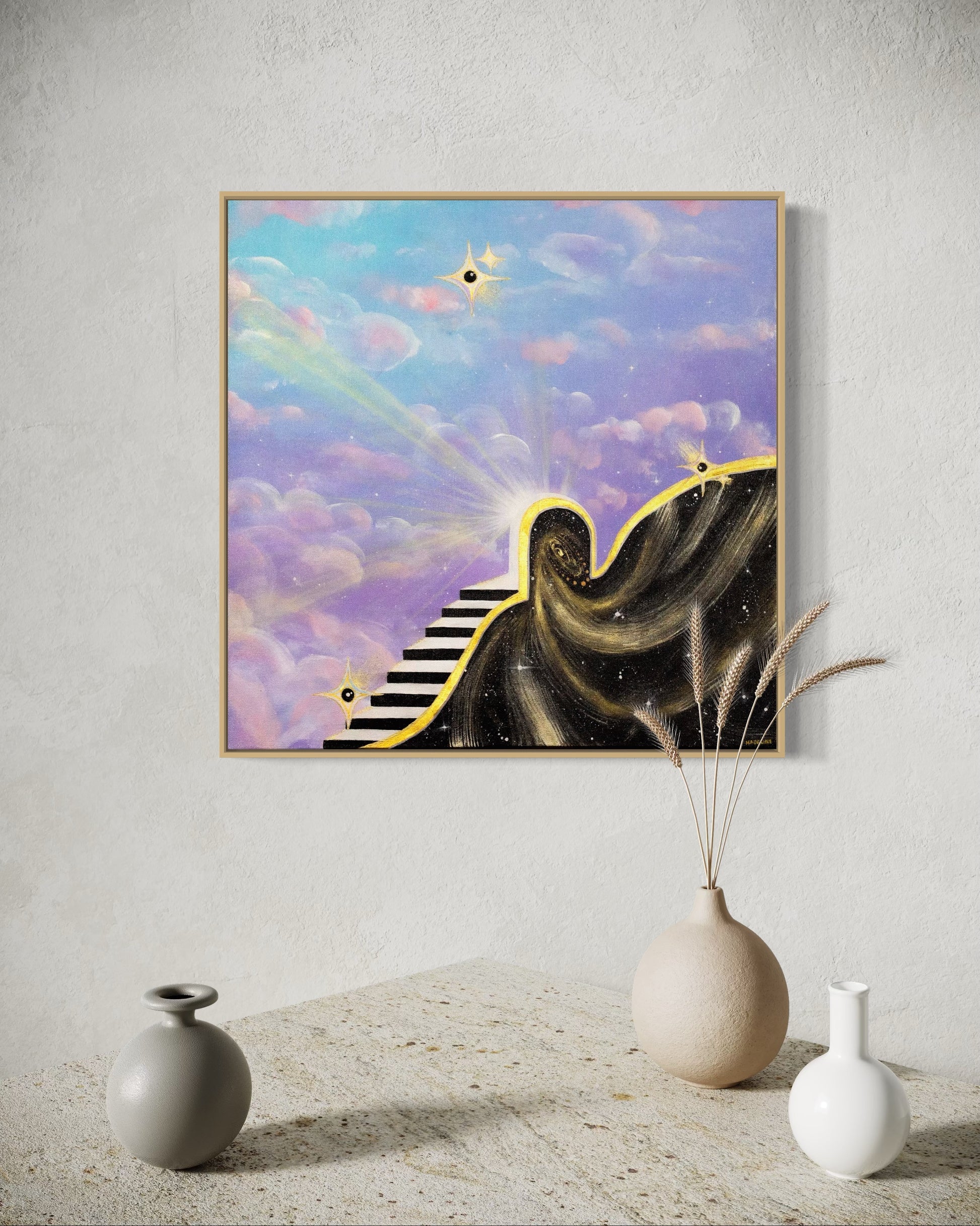 Framed artwork of a staircase leading to a star with light rays and a portal into space with a colorful blue and purple sky with clouds.