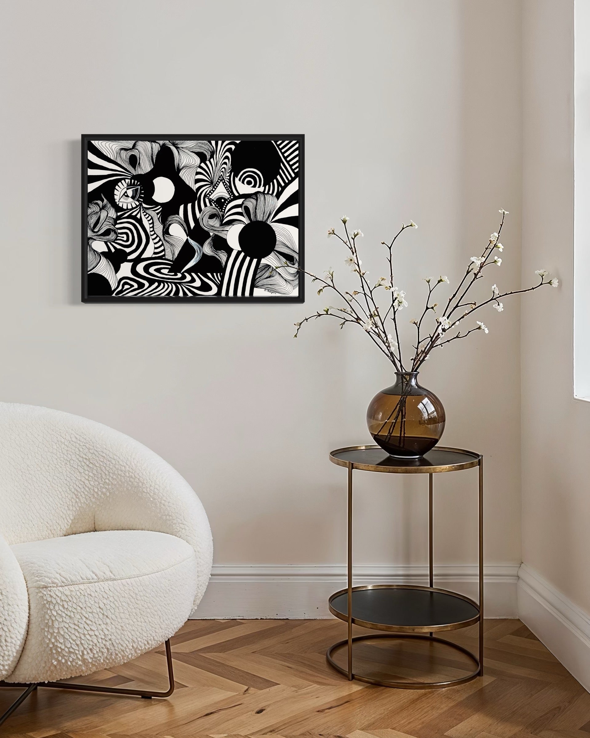 Abstract black and white artwork with swirling patterns, whimsical linework, eyes, and psychedelic patterns on a white background