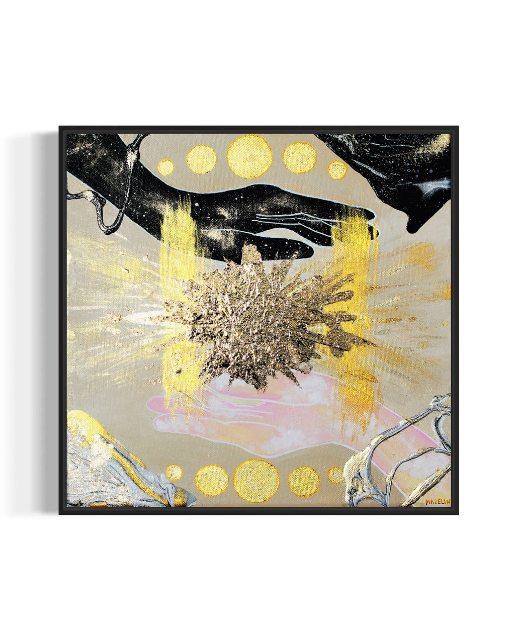 Framed abstract artwork of hands filled with the sky, an exploding gold star and geometric shapes on a tan background.