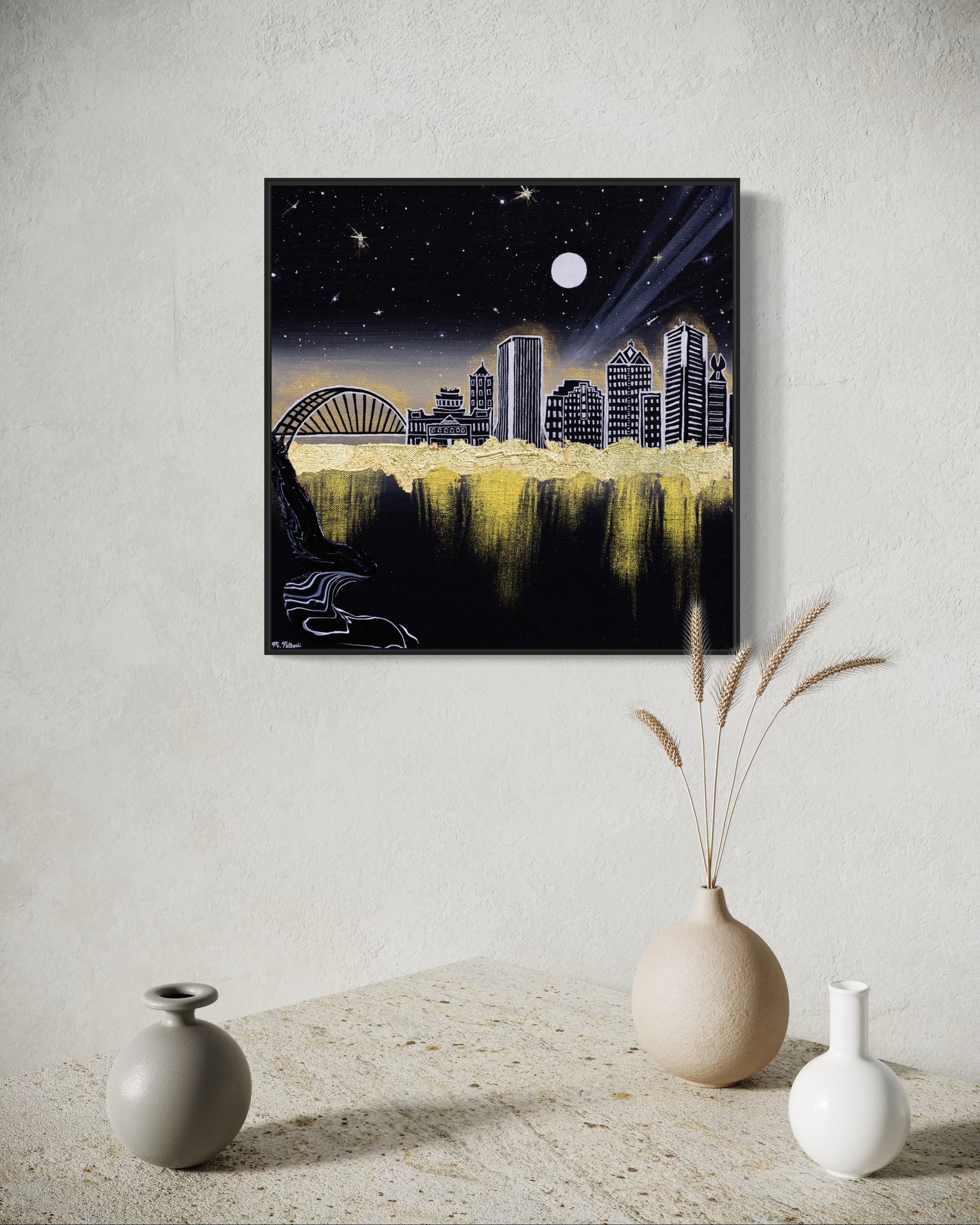 Framed artwork of Rochester, NY city skyline at night with a moonlit sky and glowing gold aura