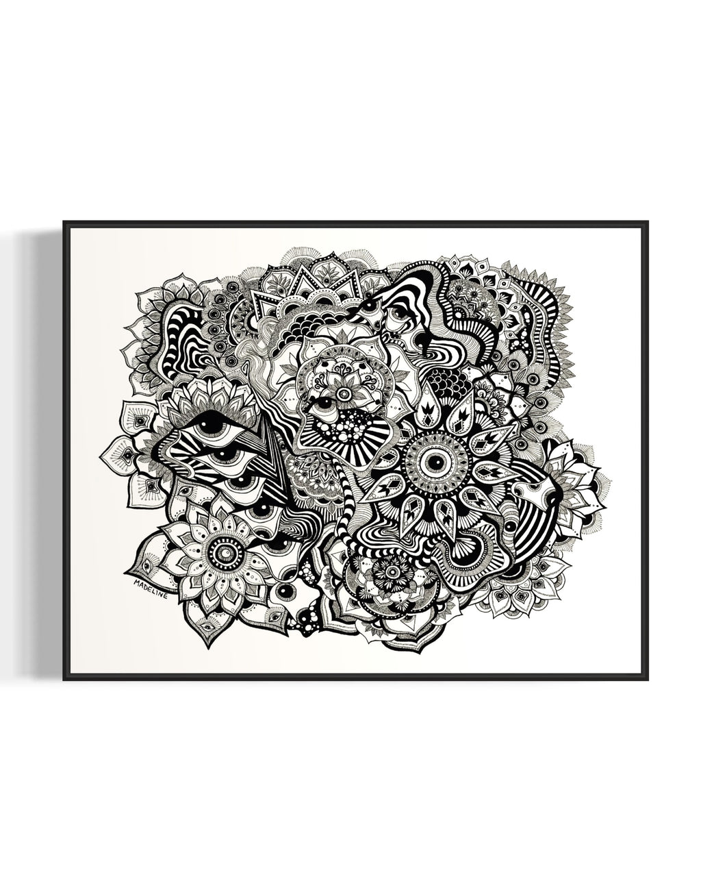 Framed black and white abstract art with eyes, mandalas, and fine line whimsical detail